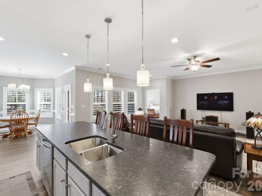 2525 Whispering Way, Indian Trail, NC 28079.  MLS# CAR4356535, YatesRealty ID 3846. Large island for prep work and extra seating