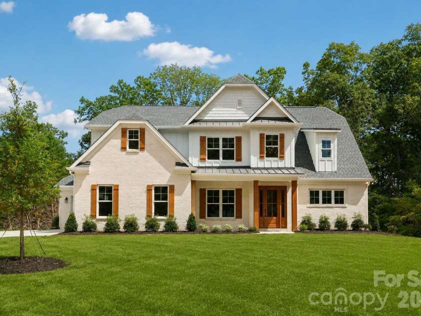 332 Point Carpenter Road, Indian Land, SC 29707.  MLS# CAR4393958, YatesRealty ID 38464. Custom-built brick home situated on a sprawling 2.14-acre lot. Grass will be installed prior to closing.