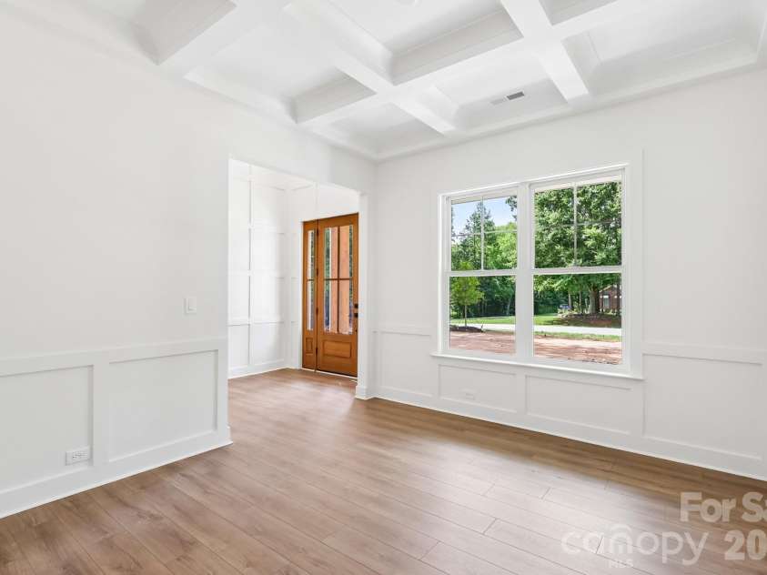 332 Point Carpenter Road, Indian Land, SC 29707.  MLS# CAR4393958, YatesRealty ID 38464. Flex/dining room with a coffered ceiling located off the two-story foyer. This versatile space is ideal for use as a formal dining room or a flex area.