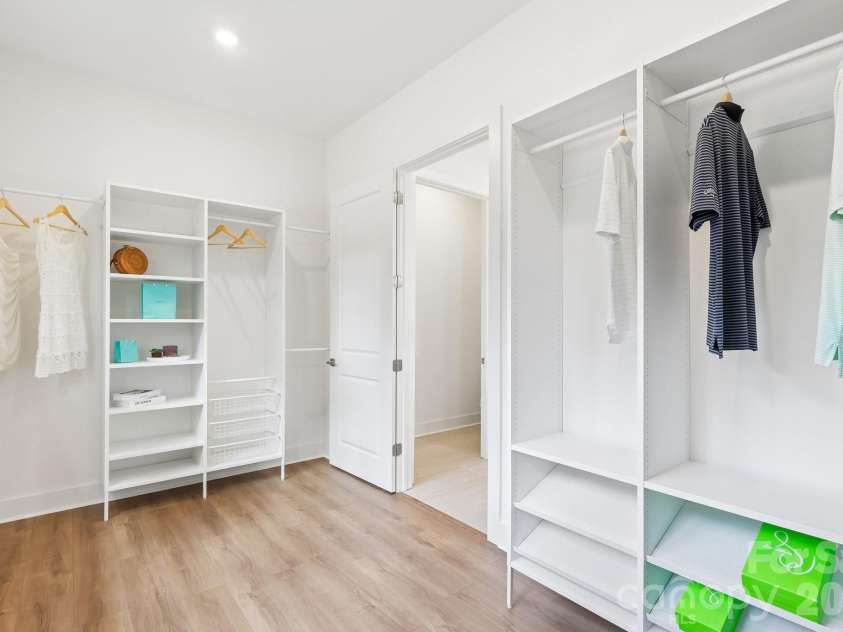 332 Point Carpenter Road, Indian Land, SC 29707.  MLS# CAR4393958, YatesRealty ID 38464. Primary bedroom closet with closet system.
