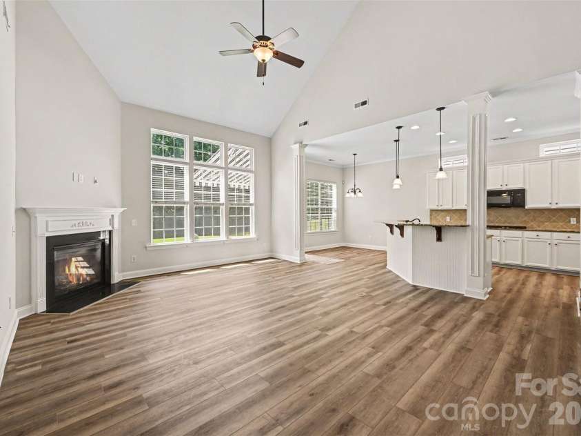 1162 Gold Rush Court, Fort Mill, SC 29708.  MLS# CAR4412511, YatesRealty ID 38468. Living, breakfast and kitchen