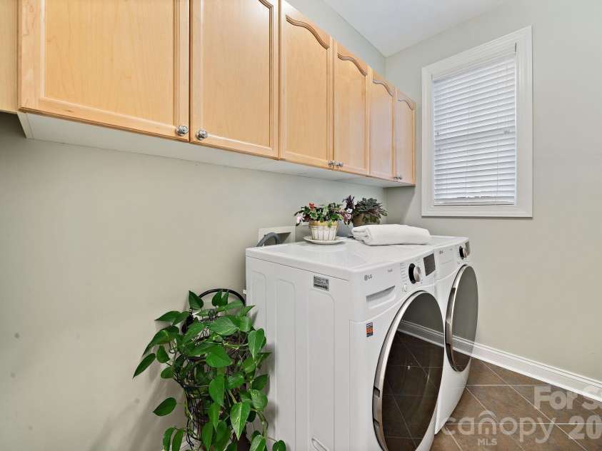 4685 Eagle Pointe Court, Denver, NC 28037.  MLS# CAR4332859, YatesRealty ID 38484. Laundry room on main level with storage