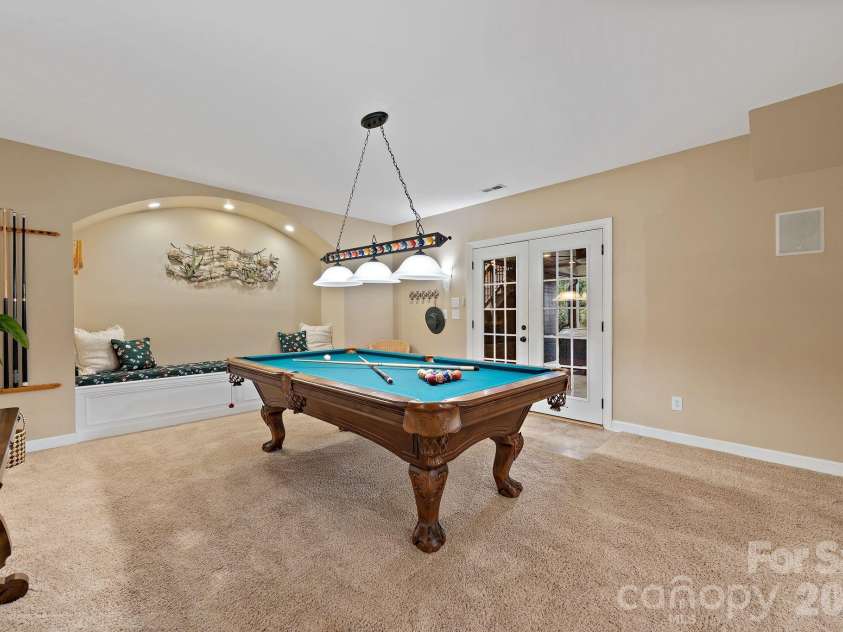 4685 Eagle Pointe Court, Denver, NC 28037.  MLS# CAR4332859, YatesRealty ID 38484. Lower level recreation room with pool table included!