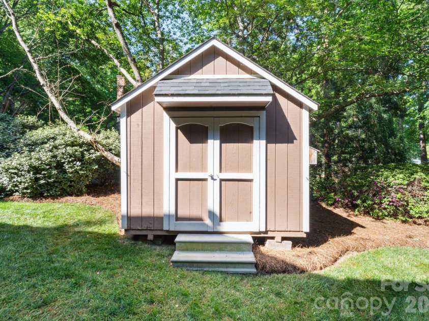 4685 Eagle Pointe Court, Denver, NC 28037.  MLS# CAR4332859, YatesRealty ID 38484. Shed for yard and garden tools.