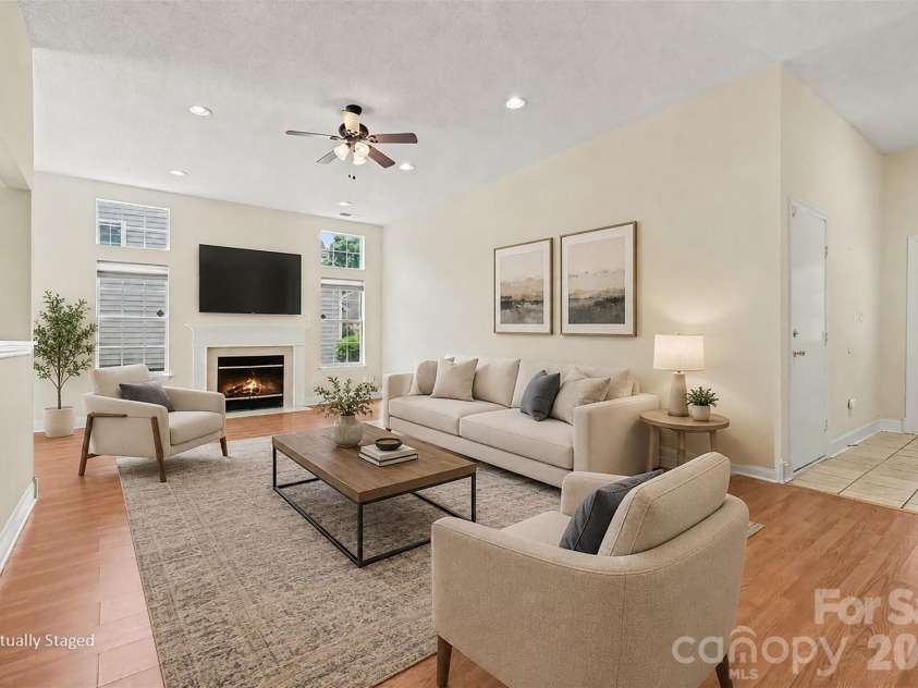 8316 Rhian Brook Lane, Charlotte, NC 28216.  MLS# CAR4402684, YatesRealty ID 38488. Almost 24' x 14' great room virtually staged