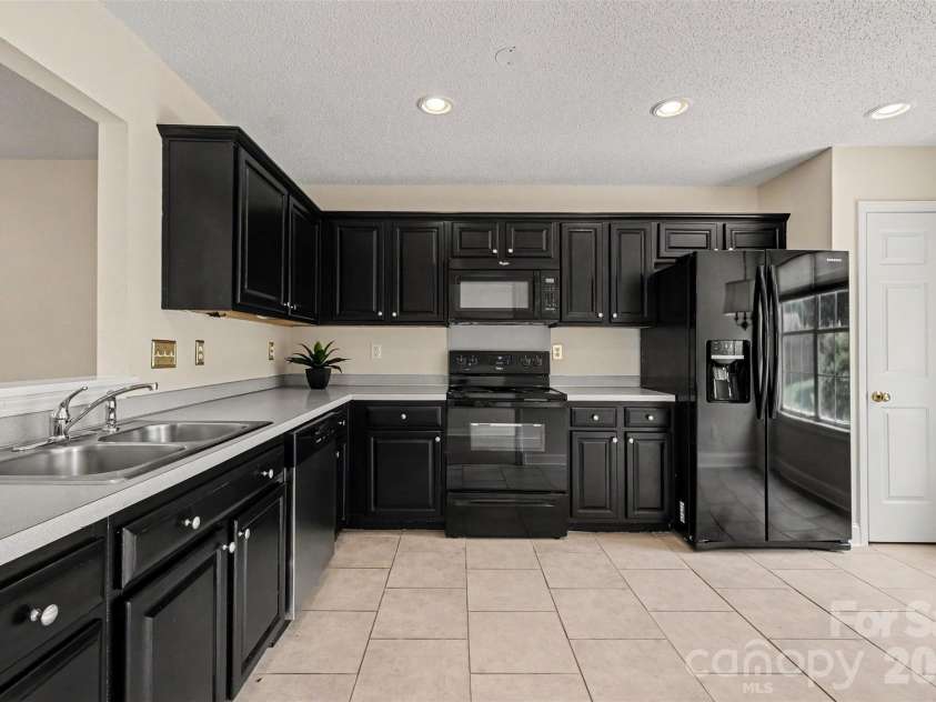 8316 Rhian Brook Lane, Charlotte, NC 28216.  MLS# CAR4402684, YatesRealty ID 38488. Includes refrigerator