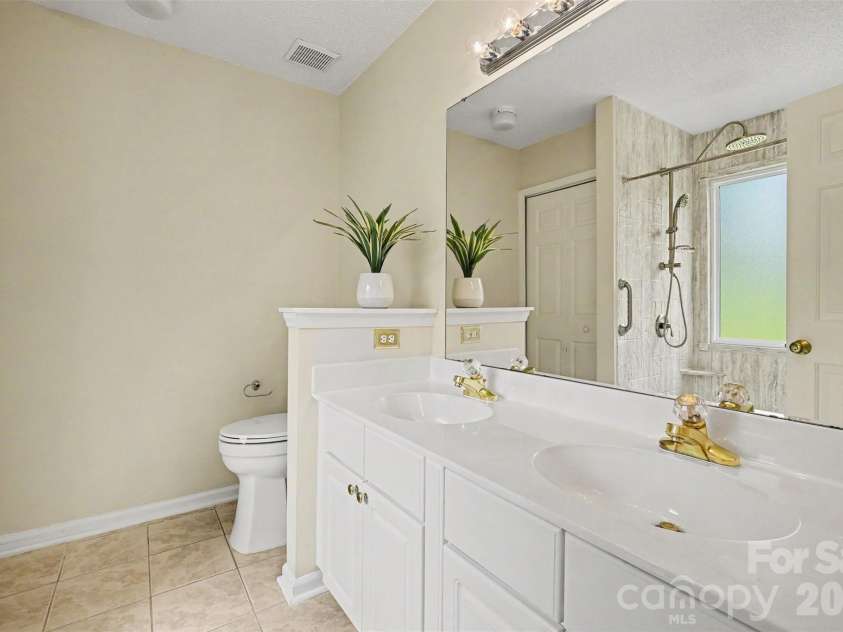 8316 Rhian Brook Lane, Charlotte, NC 28216.  MLS# CAR4402684, YatesRealty ID 38488. Primary vanity