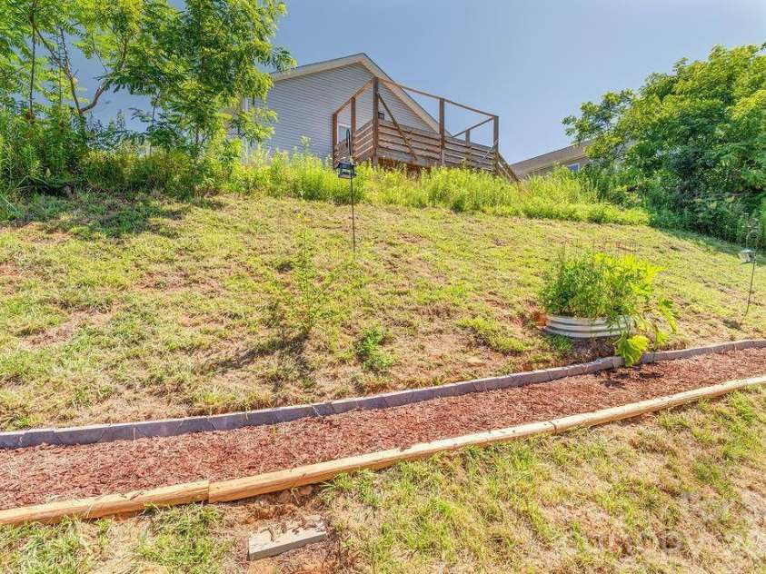 40 Quinn Hill Lane, Mars Hill, NC 28754.  MLS# CAR4395891, YatesRealty ID 38489. Back Yard Buffer