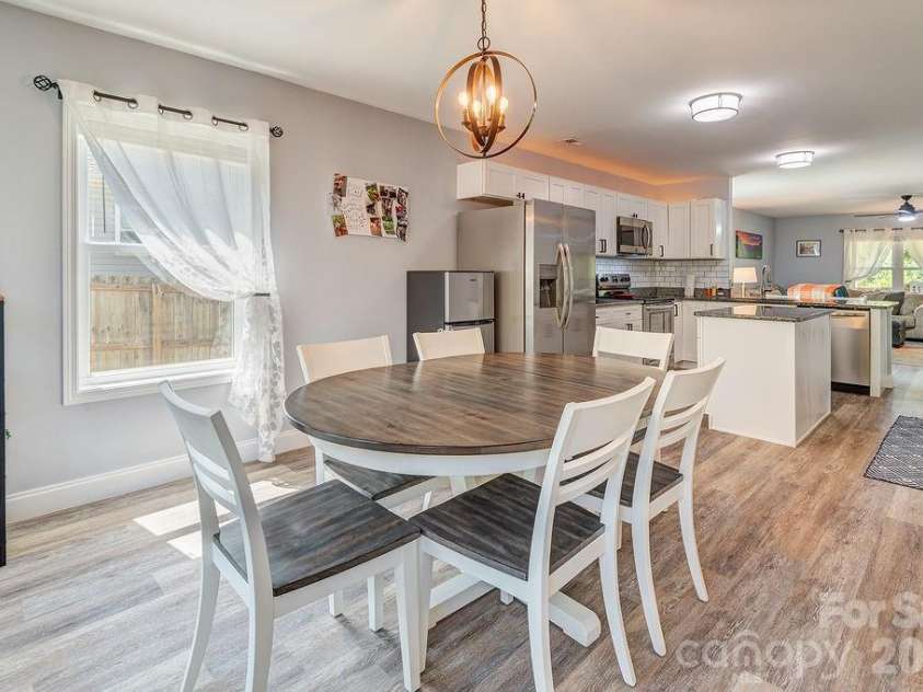 40 Quinn Hill Lane, Mars Hill, NC 28754.  MLS# CAR4395891, YatesRealty ID 38489. Dining Room into Kitchen