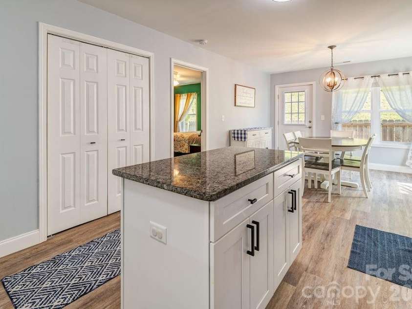 40 Quinn Hill Lane, Mars Hill, NC 28754.  MLS# CAR4395891, YatesRealty ID 38489. Kitchen Bar with Storage