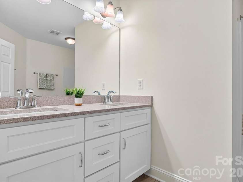 7542 Sedgebrook Drive, Stanley, NC 28164.  MLS# CAR4401228, YatesRealty ID 38497. Double vanity in upstairs bathroom