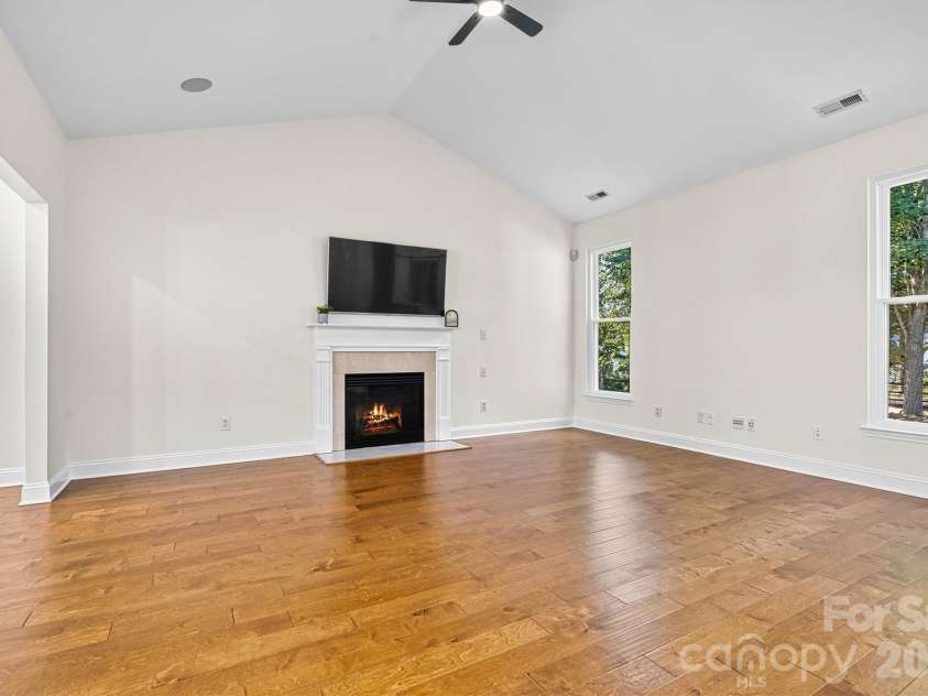 7542 Sedgebrook Drive, Stanley, NC 28164.  MLS# CAR4401228, YatesRealty ID 38497. Great Room w/ cathedral ceilings