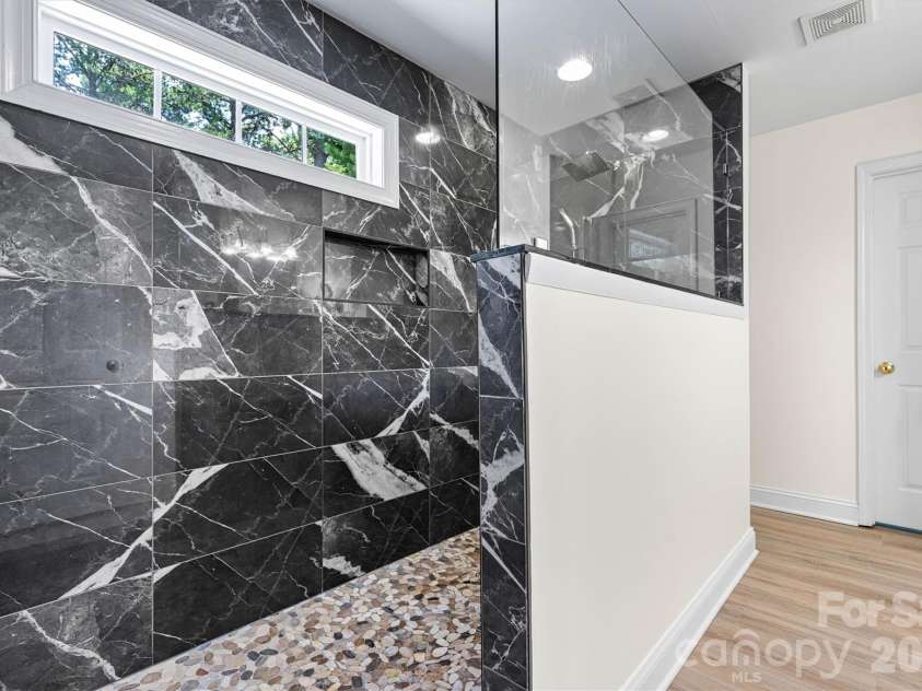 7542 Sedgebrook Drive, Stanley, NC 28164.  MLS# CAR4401228, YatesRealty ID 38497. HUGE shower in primary!