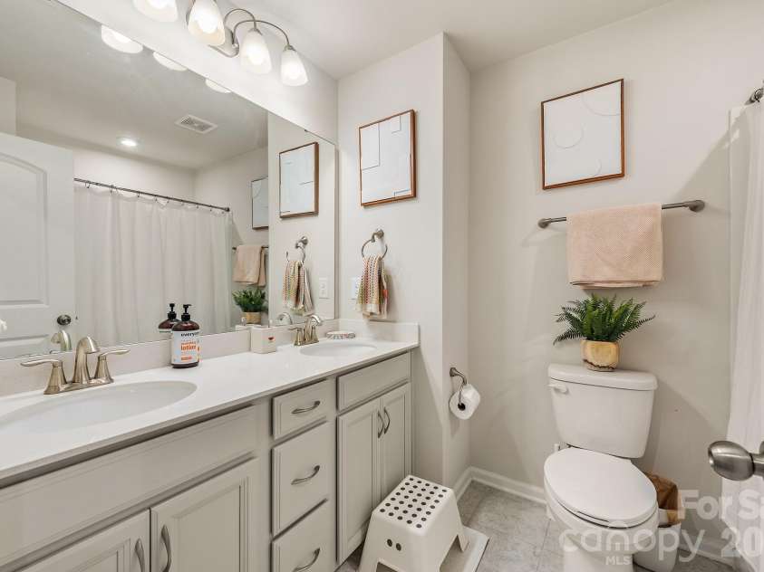 206 Marron Drive, Indian Trail, NC 28079.  MLS# CAR4356949, YatesRealty ID 3850. Hallway bathroom