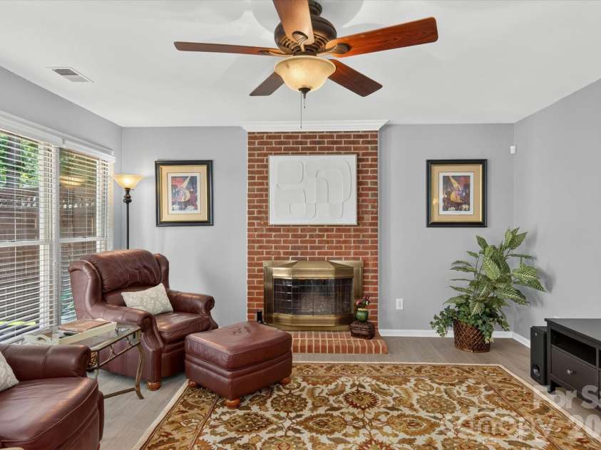 9801 Deer Spring Lane, Charlotte, NC 28210.  MLS# CAR4404766, YatesRealty ID 38506. Stunning brick fireplace