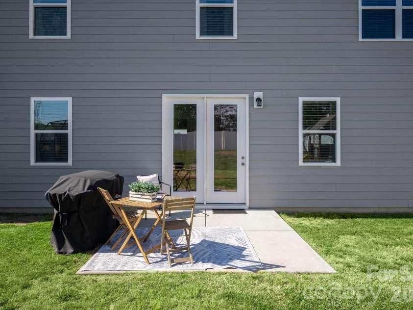 6002 Weddington Pointe Drive, Monroe, NC 28110.  MLS# CAR4377599, YatesRealty ID 38507. French doors open to the patio