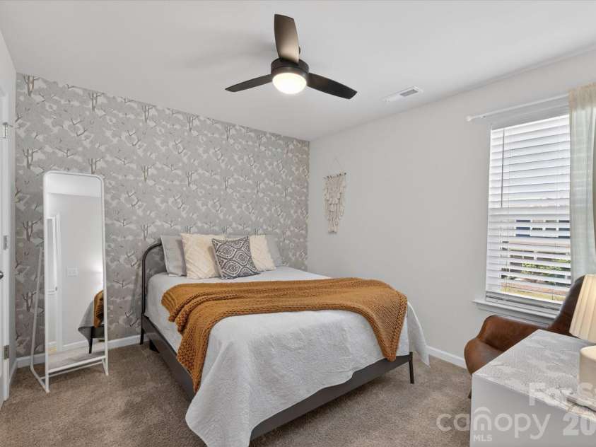 6002 Weddington Pointe Drive, Monroe, NC 28110.  MLS# CAR4377599, YatesRealty ID 38507. One of two secondary bedrooms