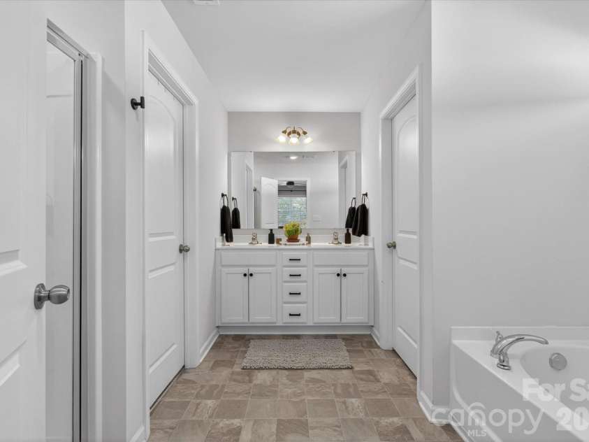 6002 Weddington Pointe Drive, Monroe, NC 28110.  MLS# CAR4377599, YatesRealty ID 38507. Owner's bathroom