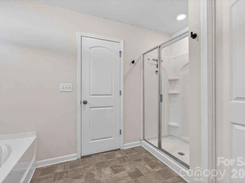 6002 Weddington Pointe Drive, Monroe, NC 28110.  MLS# CAR4377599, YatesRealty ID 38507. Owner's shower