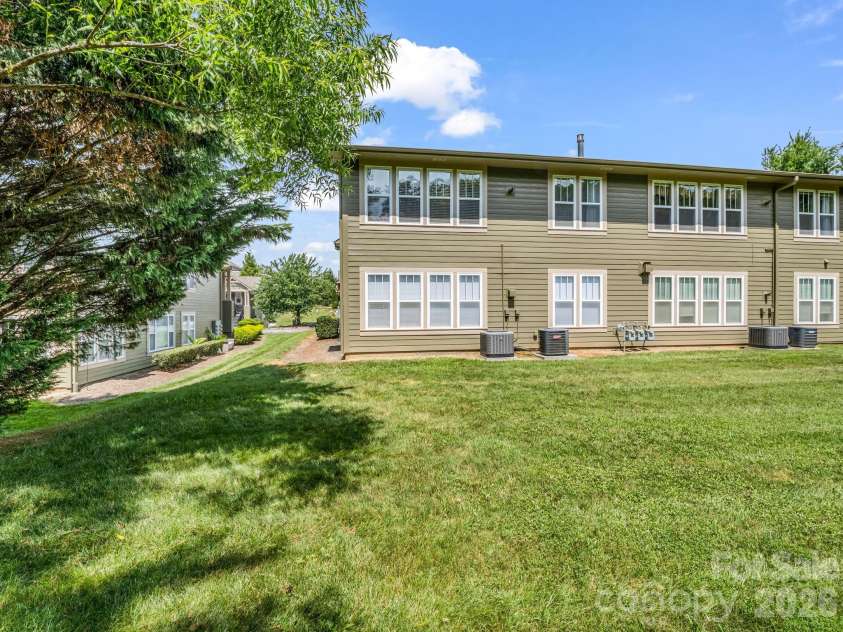 1706 Deermouse Way, Hendersonville, NC 28792.  MLS# CAR4400240, YatesRealty ID 38508. Large Greenway Behind Unit