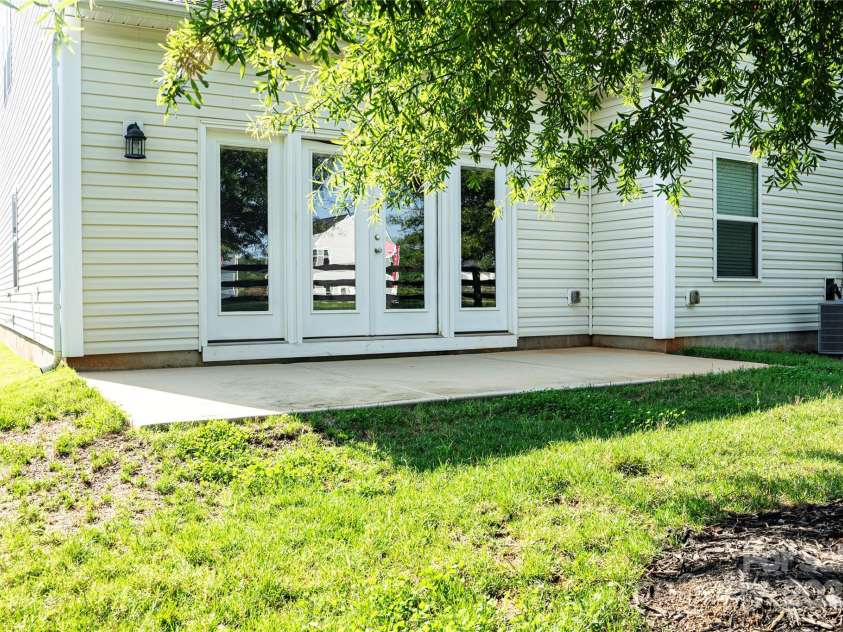 147 Fesperman Circle, Troutman, NC 28166.  MLS# CAR4166451, YatesRealty ID 3851. Back Patio