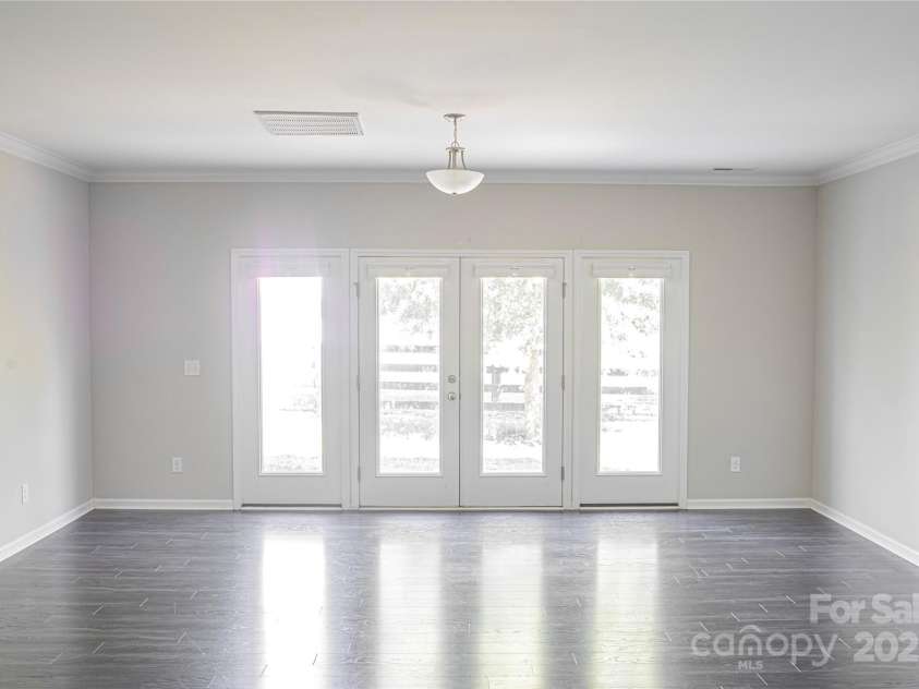 147 Fesperman Circle, Troutman, NC 28166.  MLS# CAR4166451, YatesRealty ID 3851. Great Room French Door