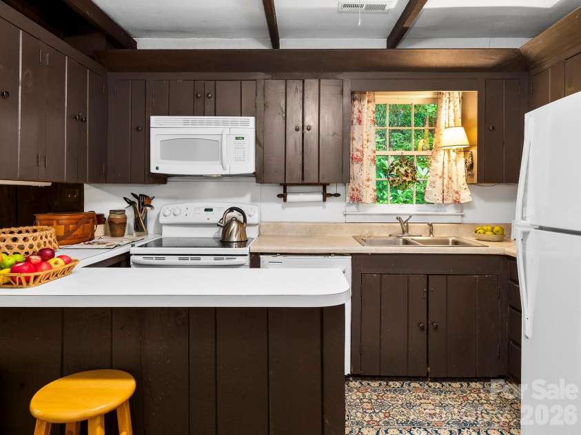 167 Sheridan Lane, Lake Lure, NC 28746.  MLS# CAR4404007, YatesRealty ID 38513. 
