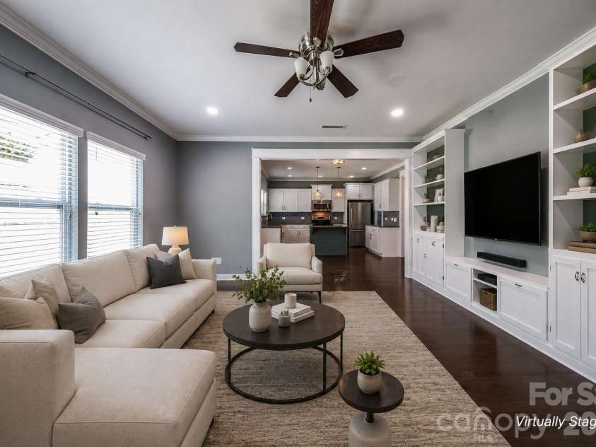 2134 Gillette Drive, Clover, SC 29710.  MLS# CAR4405603, YatesRealty ID 38521. Great Room looking towards Kitchen - Virtually Staged
