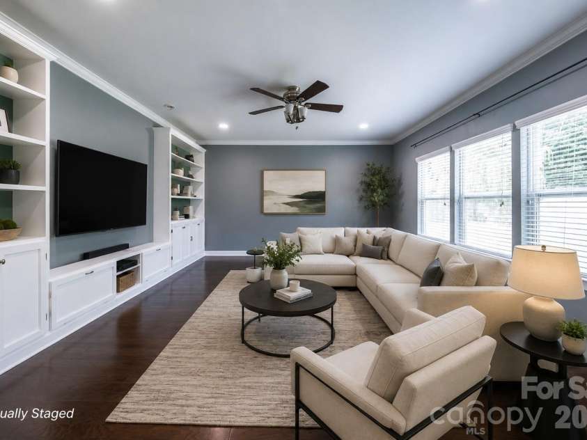 2134 Gillette Drive, Clover, SC 29710.  MLS# CAR4405603, YatesRealty ID 38521. Great Room with Built In Cabinets - Virtually Staged
