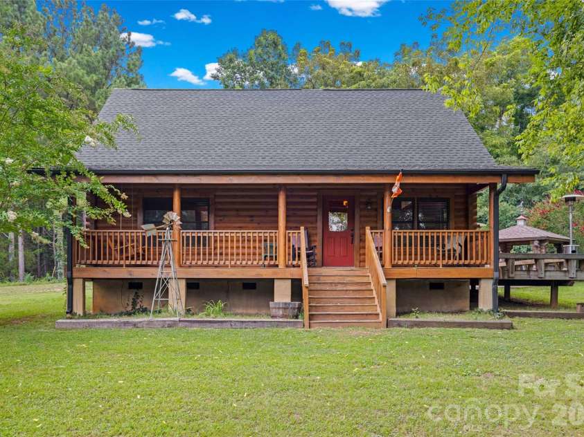 3448 Center Road, Chester, SC 29706.  MLS# CAR4403921, YatesRealty ID 38546. Picturesque Log Cabin