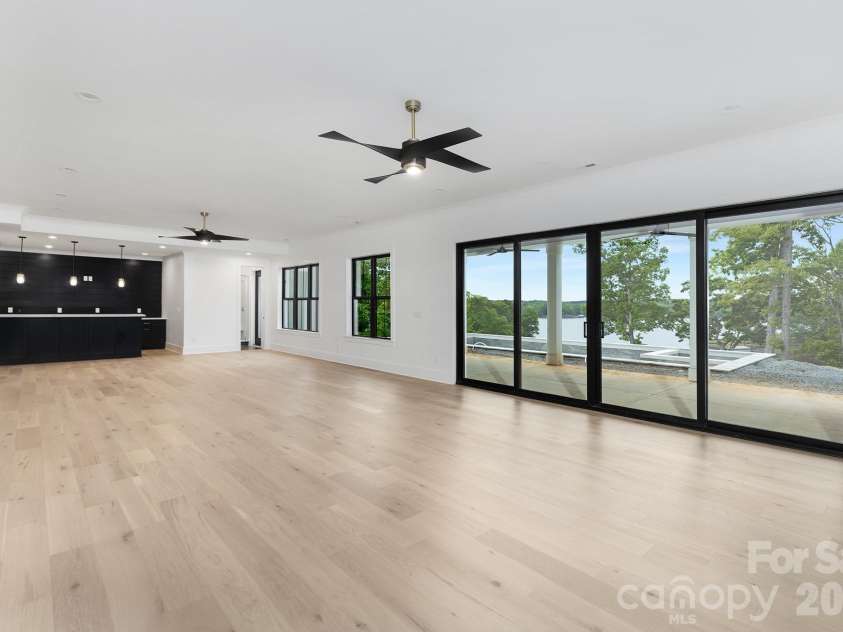 18304 Rosapenny Road, Charlotte, NC 28278.  MLS# CAR4329867, YatesRealty ID 3855. Basement recreation room