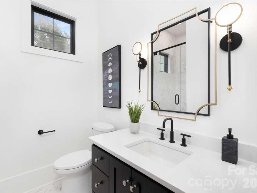 18304 Rosapenny Road, Charlotte, NC 28278.  MLS# CAR4329867, YatesRealty ID 3855. First floor guest bathroom for bedroom #2