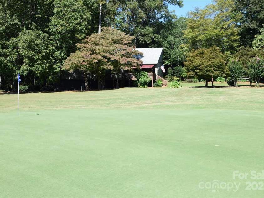 100 Fairway Ridge, Clover, SC 29710.  MLS# CAR4307573, YatesRealty ID 3856. LOOKING ACROSS 15 HOLE TO BACK.