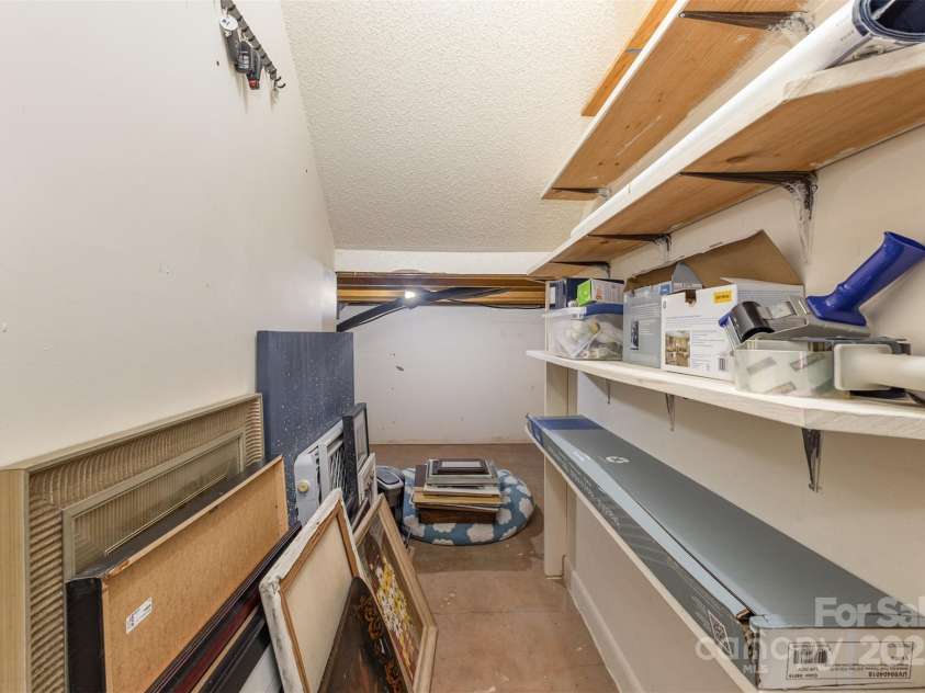 100 Fairway Ridge, Clover, SC 29710.  MLS# CAR4307573, YatesRealty ID 3856. LOWER-LEVEL WALK IN STORAGE.