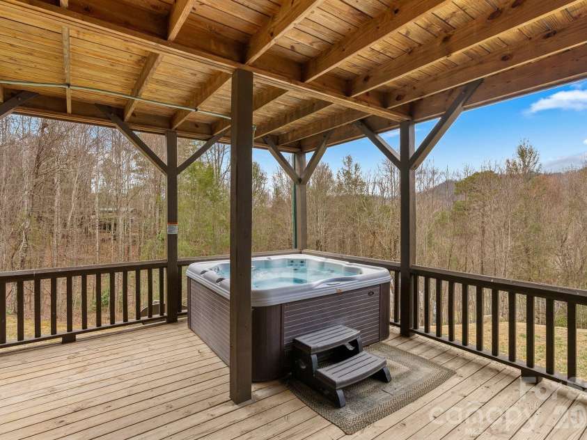 264 Moonbeam Lane, Clyde, NC 28721.  MLS# CAR4344576, YatesRealty ID 3856. Cozy Hot Tub 