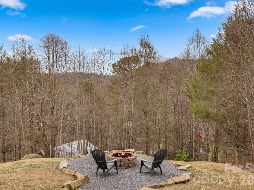 264 Moonbeam Lane, Clyde, NC 28721.  MLS# CAR4344576, YatesRealty ID 3856. Firepit Under the Stars