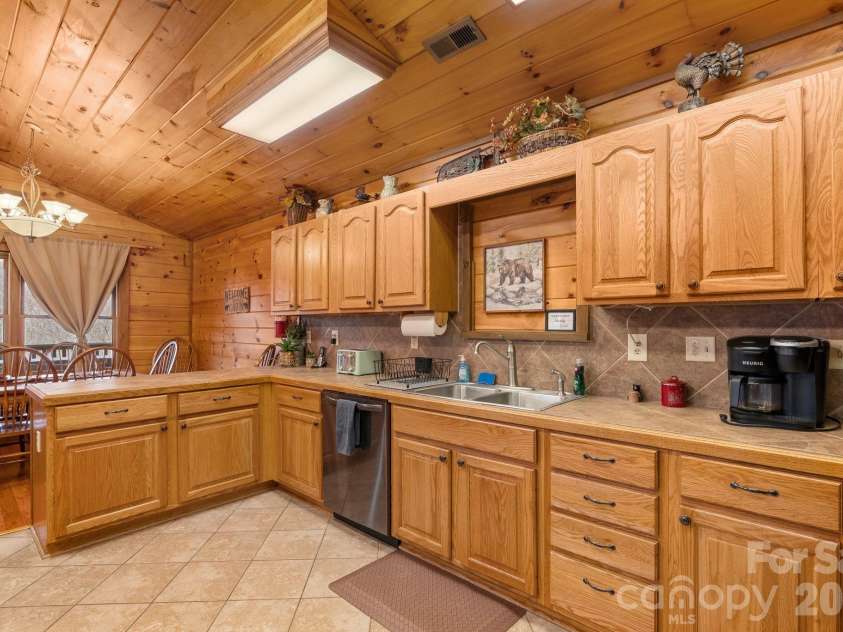 264 Moonbeam Lane, Clyde, NC 28721.  MLS# CAR4344576, YatesRealty ID 3856. Kitchen
