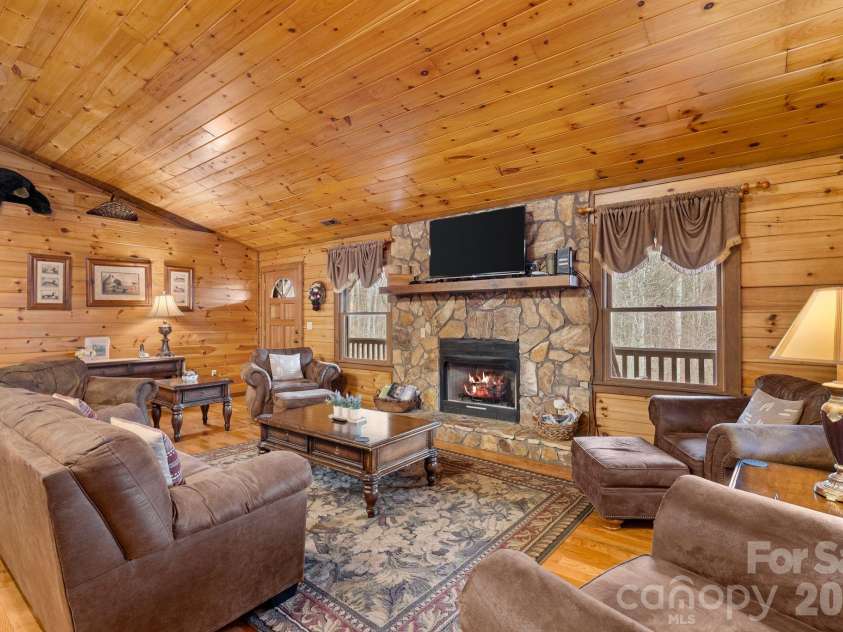 264 Moonbeam Lane, Clyde, NC 28721.  MLS# CAR4344576, YatesRealty ID 3856. Living room up 