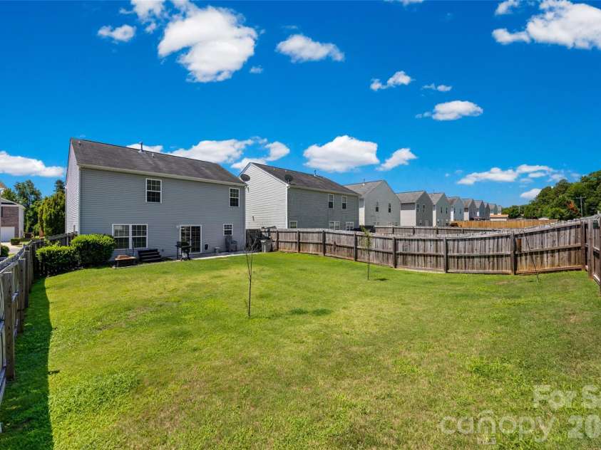1772 Eastway Drive, Dallas, NC 28034.  MLS# CAR4404398, YatesRealty ID 38560. LARGE, LEVEL, AND FULLY FENCED BACK YARD!