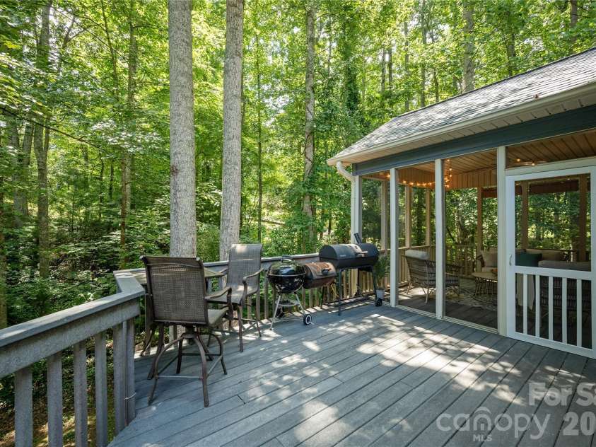 7 Oak Hollow Drive, Asheville, NC 28805.  MLS# CAR4406097, YatesRealty ID 38574. Back deck