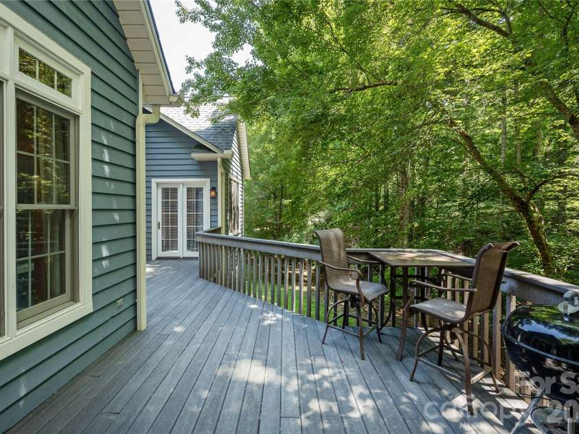 7 Oak Hollow Drive, Asheville, NC 28805.  MLS# CAR4406097, YatesRealty ID 38574. Back deck