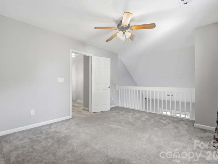 6068 Bobcat Place, Charlotte, NC 28269.  MLS# CAR4383046, YatesRealty ID 38581. Loft/third bedroom.