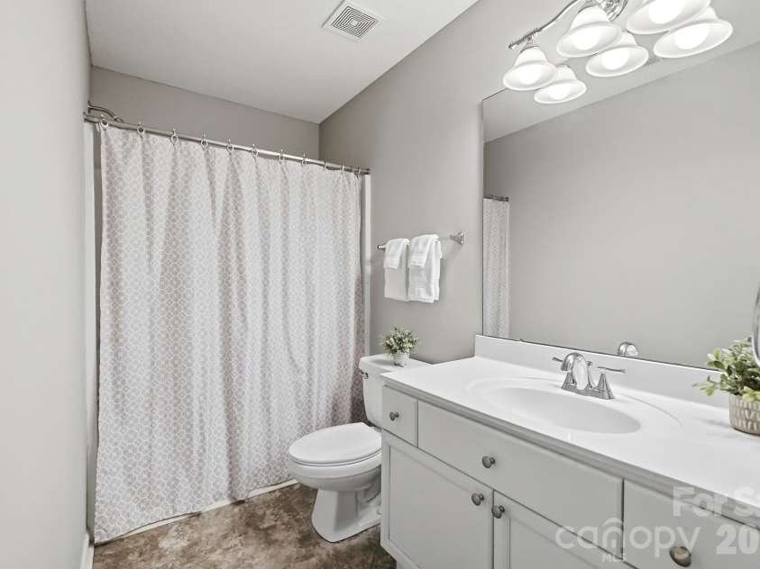 6068 Bobcat Place, Charlotte, NC 28269.  MLS# CAR4383046, YatesRealty ID 38581. Secondary bathroom.
