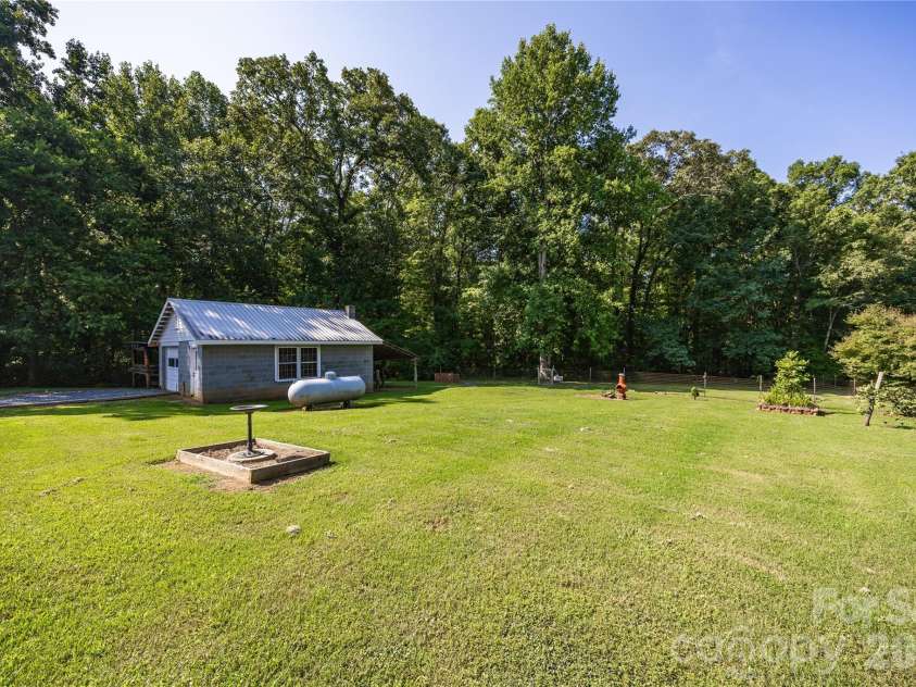 545 Mt. Shepherd Road, Asheboro, NC 27205.  MLS# CAR4403323, YatesRealty ID 38584. Back yard with fenced area