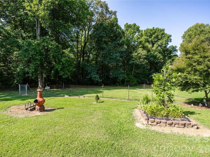 545 Mt. Shepherd Road, Asheboro, NC 27205.  MLS# CAR4403323, YatesRealty ID 38584. Back yard with fenced area