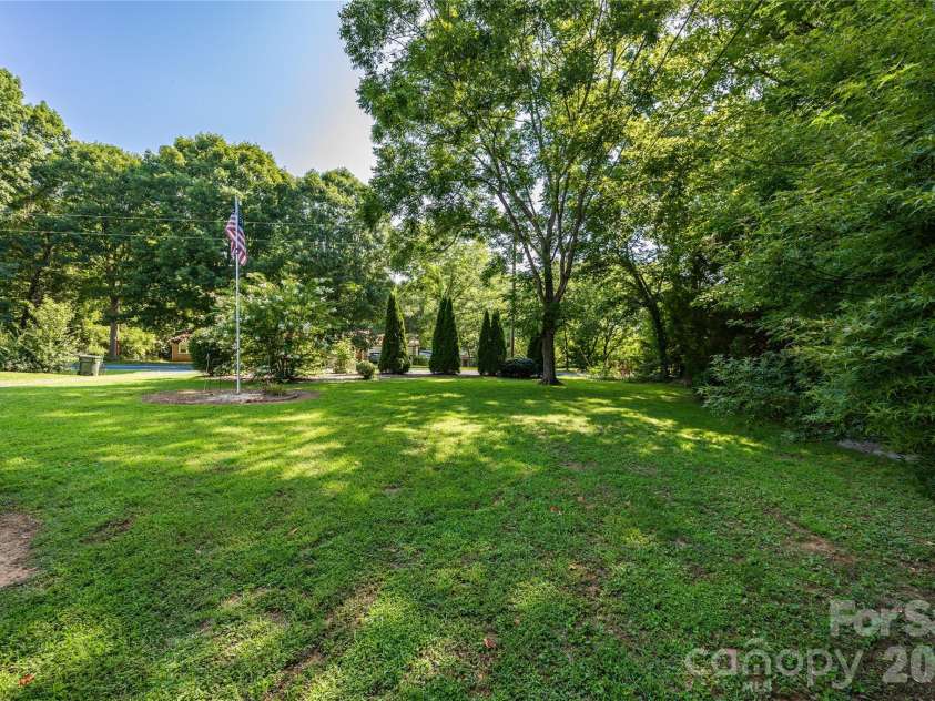 545 Mt. Shepherd Road, Asheboro, NC 27205.  MLS# CAR4403323, YatesRealty ID 38584. Side yard