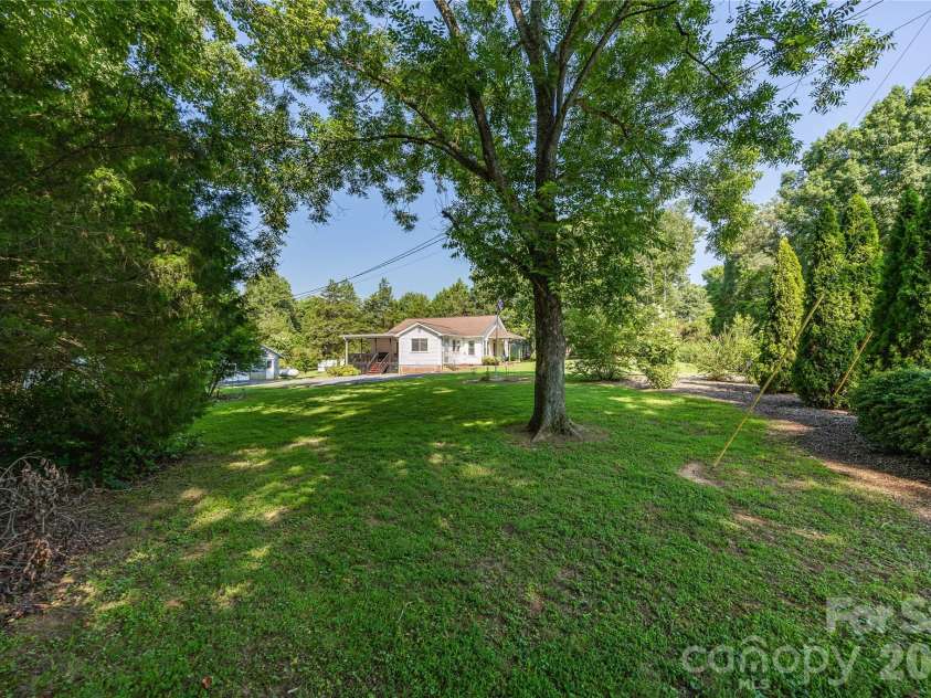 545 Mt. Shepherd Road, Asheboro, NC 27205.  MLS# CAR4403323, YatesRealty ID 38584. Side yard