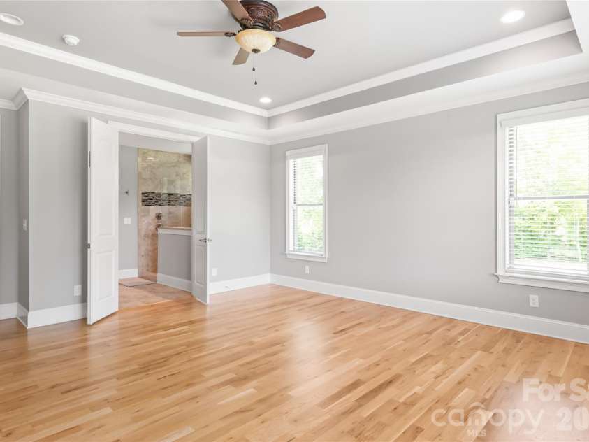 1808 Huntley Ridge Drive, Concord, NC 28025.  MLS# CAR4401612, YatesRealty ID 38588. Primary Suite with Tray Ceiling