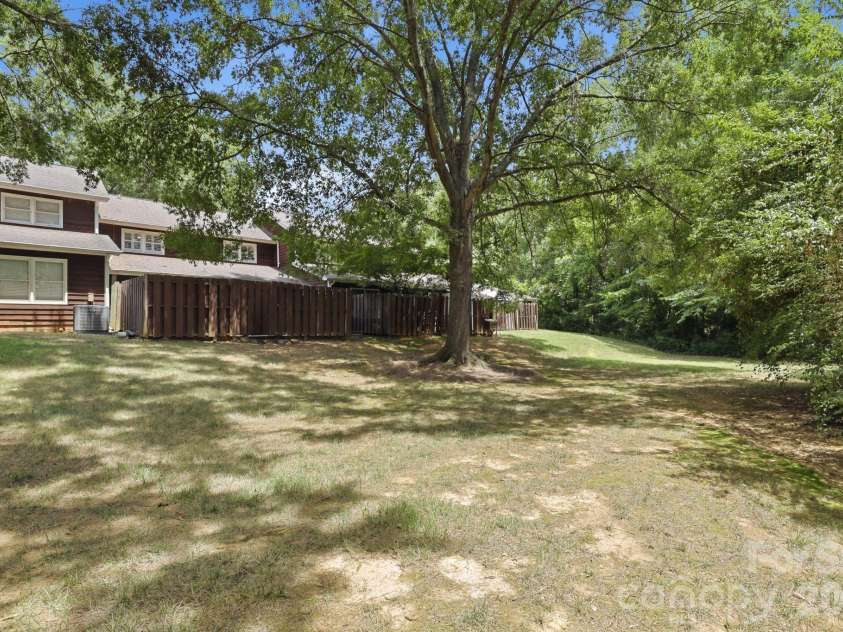 2500 Round Table Road, Monroe, NC 28110.  MLS# CAR4403153, YatesRealty ID 38591. Open Green Space Behind the Home