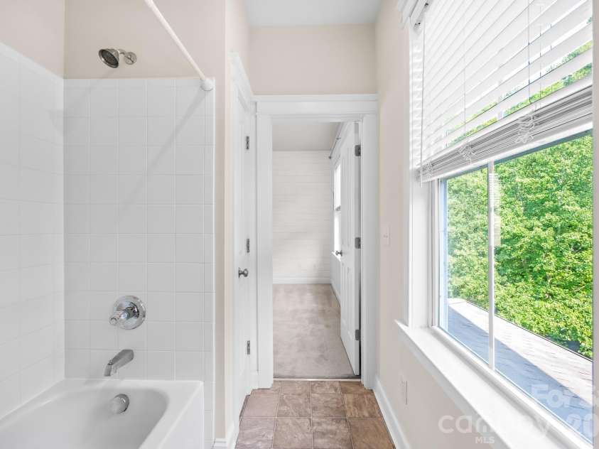 122 Gresham Lane, Mooresville, NC 28117.  MLS# CAR4400373, YatesRealty ID 38594. Jack and jill shower room